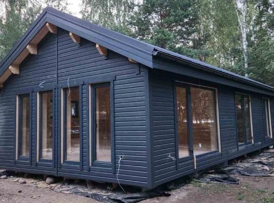 finished house  project moderna   large log cabins 655f1b61239f2
